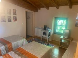 Postel nebo postele na pokoji v ubytování Aitzkorri Zegama