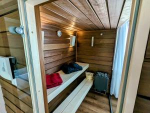a small room with a bed in a sauna at Wellness Appartement Cochem in Cochem