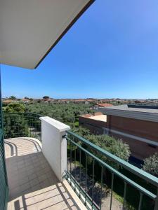 a view from the balcony of a building at Voglia di mare Versilia in Querceta