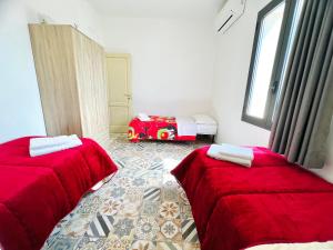 Postel nebo postele na pokoji v ubytování Magaggiari Reef