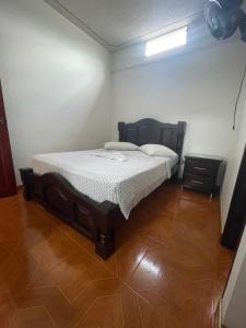 Voodi või voodid majutusasutuse Hospedaje Castillo Real toas
