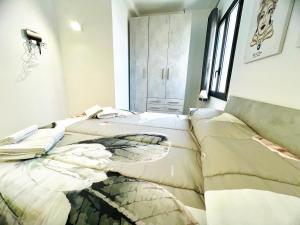 Postel nebo postele na pokoji v ubytování Magaggiari Reef