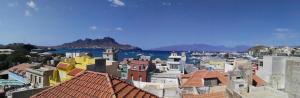 a view of a city with buildings and the water at STUDIO VUE MER - CASA da LUZ in Mindelo