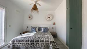 Postel nebo postele na pokoji v ubytování Malhada do Sao