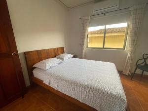 Voodi või voodid majutusasutuse Hospedaje Castillo Real toas