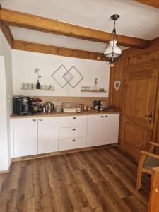 Kuchyň nebo kuchyňský kout v ubytování Haus Rupitsch