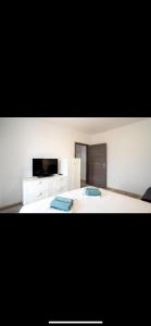 Postel nebo postele na pokoji v ubytování Apartman Jan