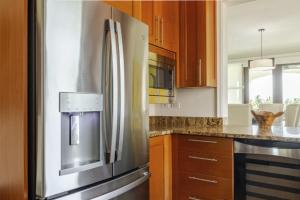 Kuchyň nebo kuchyňský kout v ubytování Coco Beach Resort Condo