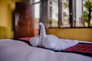 Letto o letti in una camera di Nepali Heritage Hotel