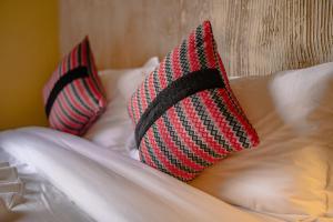 Letto o letti in una camera di Nepali Heritage Hotel