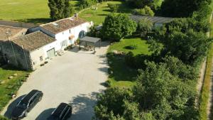 an aerial view of a house with a driveway at La Ruche in Paizay-Naudouin +16 photos