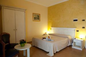 Кровать или кровати в номере Hotel City