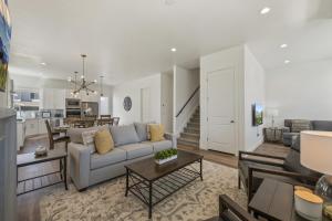 a living room with a couch and a table at New Home in Heber City in Heber City