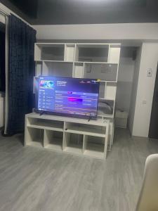 TV a/nebo společenská místnost v ubytování Studio