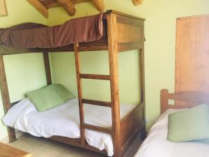 Ένα ή περισσότερα κρεβάτια σε δωμάτιο στο Posadas Aurelio