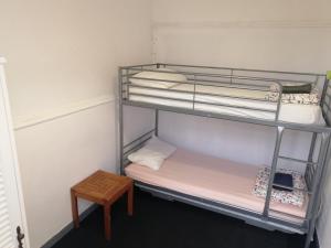 A bed or beds in a room at La Casita de Arrecife
