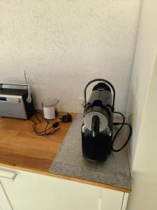 Příslušenství pro přípravu čaje a kávy v ubytování Ferienwohnung im Haus Castor