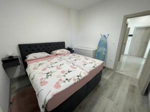 Postel nebo postele na pokoji v ubytování Apartments Adria