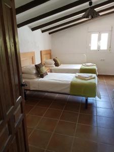 Postel nebo postele na pokoji v ubytování Finca Las Minas + 22 fotografií