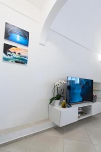 TV a/nebo společenská místnost v ubytování La Rosa di Capri