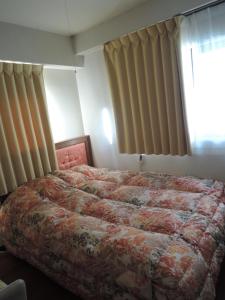 Кровать или кровати в номере Nikko Park Lodge Tobu Station