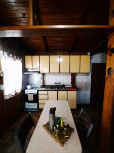 Kuchyň nebo kuchyňský kout v ubytování Cumbre House + 9 fotografií