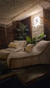 a couple of beds in a room with at VILLA GEORGIA in Acharavi