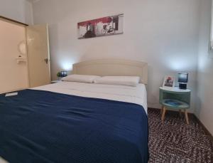 A bed or beds in a room at Nettuno 137D