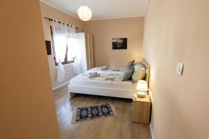 Postel nebo postele na pokoji v ubytování Kaldrma Guesthouse
