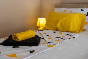Postel nebo postele na pokoji v ubytování Kaldrma Guesthouse