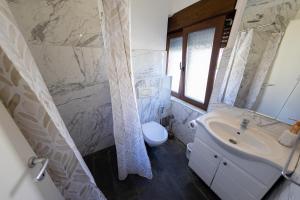 Koupelna v ubytování Kaldrma Guesthouse
