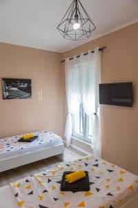 Postel nebo postele na pokoji v ubytování Kaldrma Guesthouse