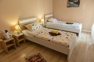 Postel nebo postele na pokoji v ubytování Kaldrma Guesthouse