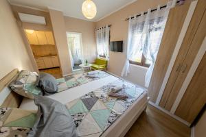 Postel nebo postele na pokoji v ubytování Kaldrma Guesthouse