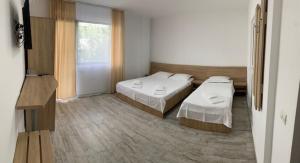 Postel nebo postele na pokoji v ubytování Panoramic