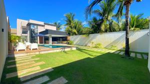 Vườn quanh Casa Sonho de Praia Guarajuba