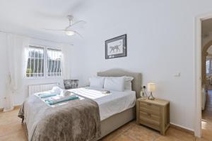 Ένα ή περισσότερα κρεβάτια σε δωμάτιο στο Casa Mitra +28 φωτογραφίες