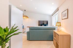 Μια τηλεόραση ή/και κέντρο ψυχαγωγίας στο GuestReady - Casa do Jacarandá