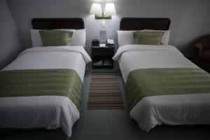 Postel nebo postele na pokoji v ubytování Hotel Internacional La Triada