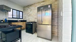 Nhà bếp/bếp nhỏ tại Casa Sonho de Praia Guarajuba