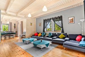 a living room with a couch and a table at Zakątek Leśny in Istebna