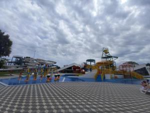 a water park with a playground with a slide at Vila Madams - Palić-Serbia in Palić