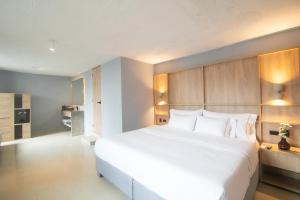 Postel nebo postele na pokoji v ubytování Mood Matuna Hotel Cartagena