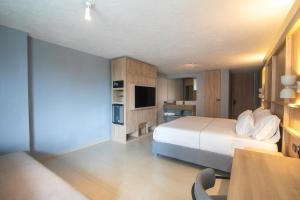 TV a/nebo společenská místnost v ubytování Mood Matuna Hotel Cartagena