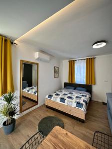 Postel nebo postele na pokoji v ubytování Central studio apartment