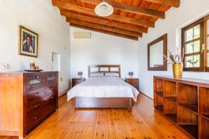 Postel nebo postele na pokoji v ubytování Finca El Capricho