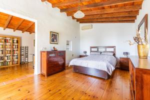 Postel nebo postele na pokoji v ubytování Finca El Capricho