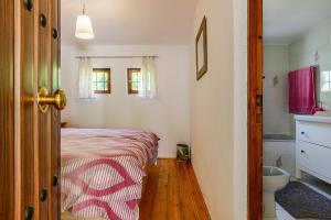 Postel nebo postele na pokoji v ubytování Finca El Capricho