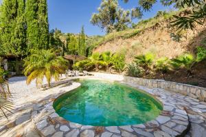 Bazén v ubytování Finca El Capricho nebo v jeho okolí