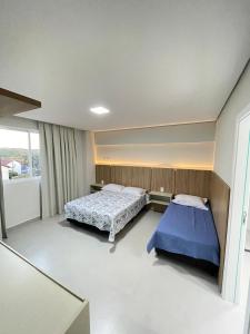 Postel nebo postele na pokoji v ubytování M3 - Apartamento CANCUN em ótima localização